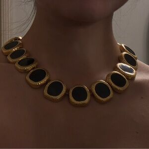 Elegant Gold and Black Necklace